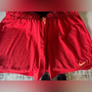 Red nike shorts